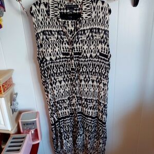 Beige black sleeveless dress.